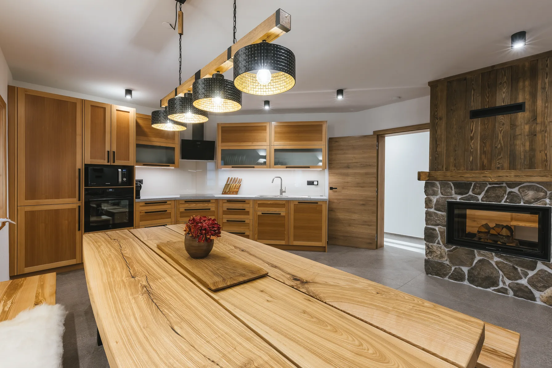 Kitchen and dining table with fireplace view