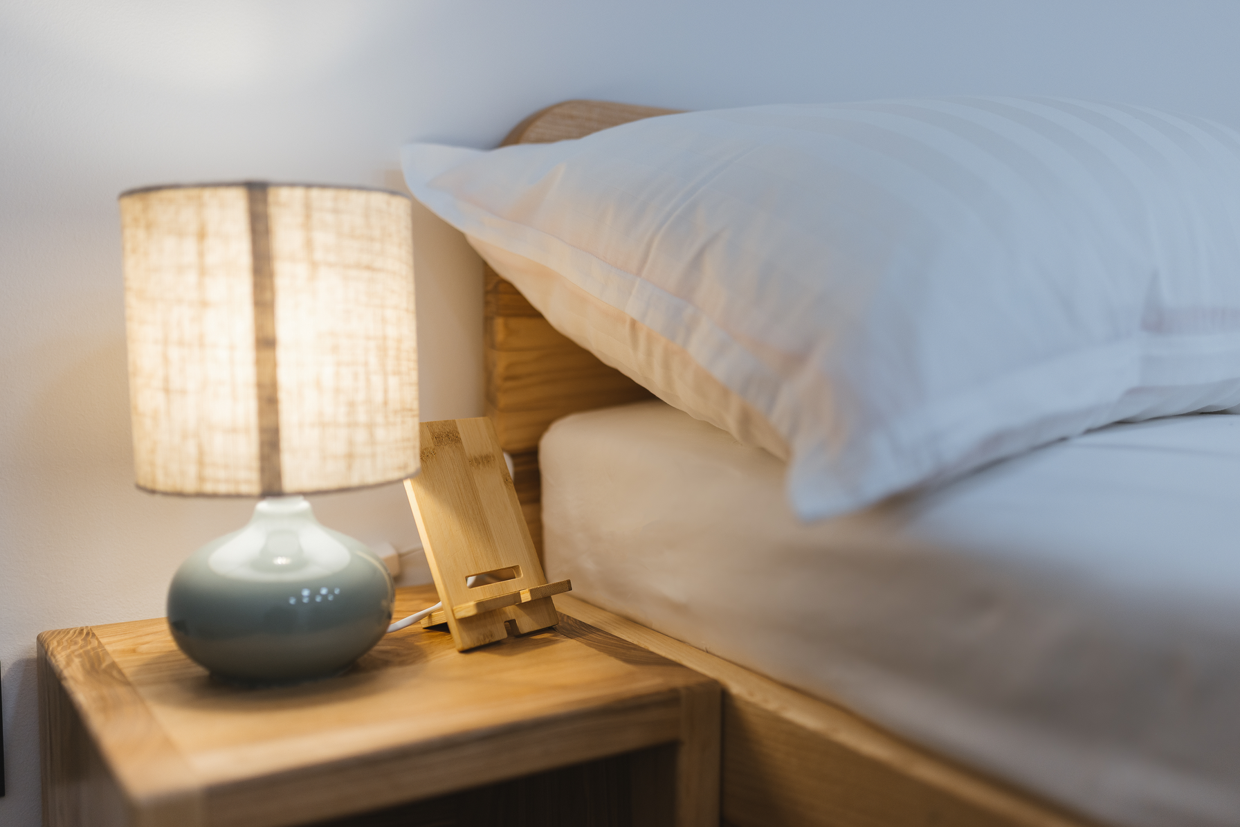 Bedside lamp and phone stand detail