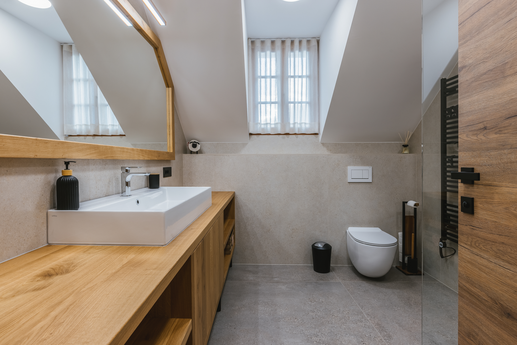 Upstairs bathroom full view with vanity and toilet